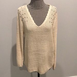 Cream sweater with silver detailing
